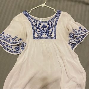 white shirt with blue detail